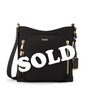 Tumi Black Crossbody Bag with Gold Accents